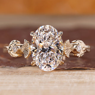Vintage diamond ring with oval cut centre stone.
