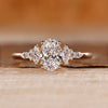 Oval cut diamond ring marquise round muse tapered shank.
