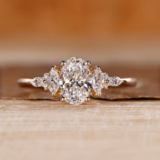 Oval cut diamond ring marquise round muse tapered shank.
