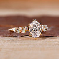 Lab grown oval diamond ring vintage cluster style.
