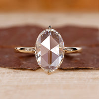 Oval rose cut diamond ring compass claw prong solitaire.
