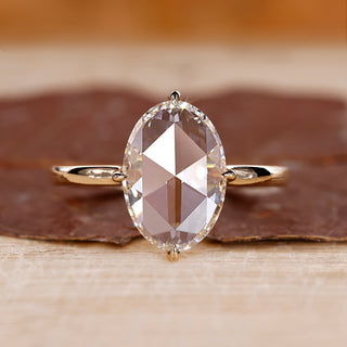 Oval rose cut diamond ring compass claw prong solitaire.
