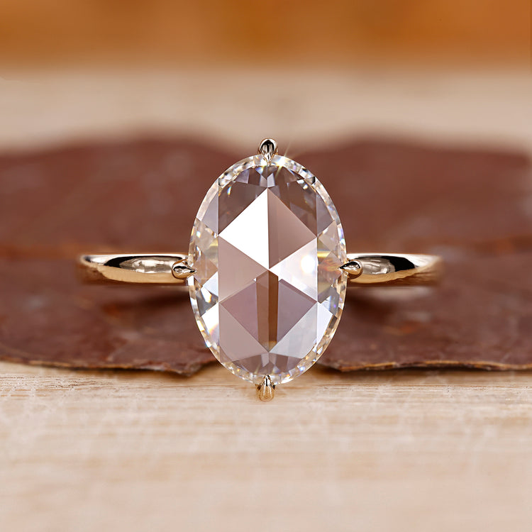 Oval rose cut diamond ring compass claw prong solitaire.
