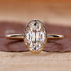 Oval old European cut diamond ring eight claw prong.

