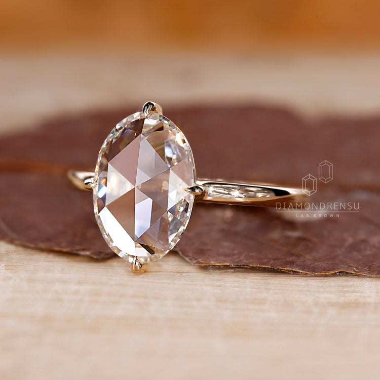 Lab grown oval rose diamond ring solitaire style.
