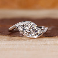 East West Engagement Ring with marquise cut lab grown diamond.
