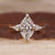 Three Stone Engagement Ring with Dutch marquise center diamond.
