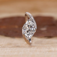 Bypass Setting Ring with east west marquise diamond.
