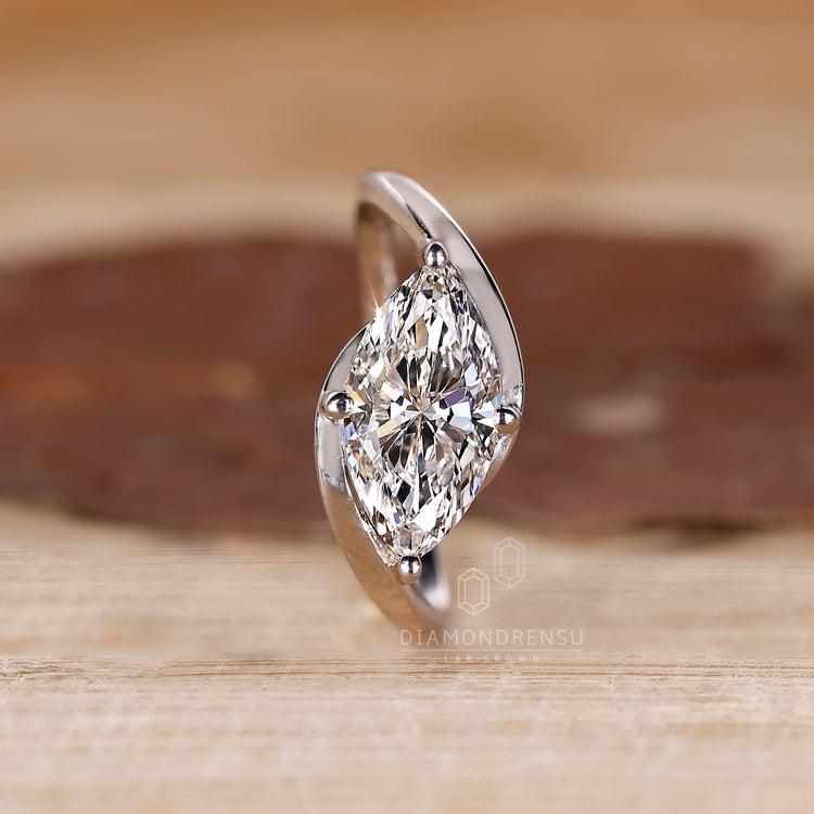 Bypass Setting Ring with east west marquise diamond.
