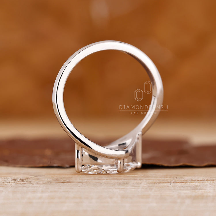 White Gold Ring with east west setting and custom design.
