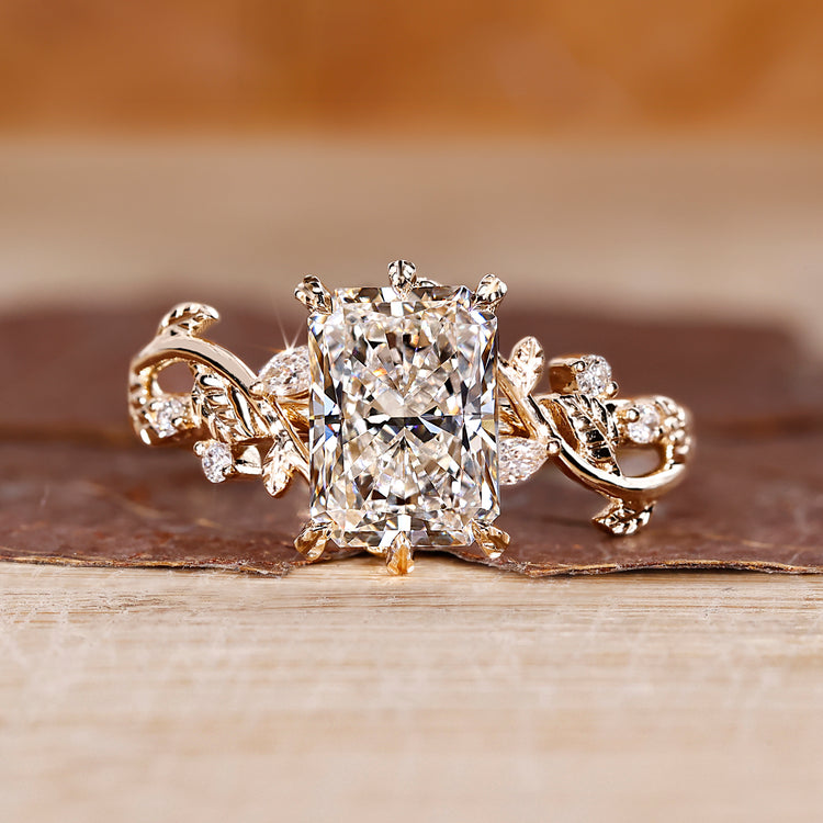 Nature inspired radiant diamond ring with leaf-style prongs.
