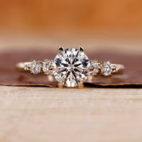 Yellow gold engagement ring with round diamond engagement ring.
