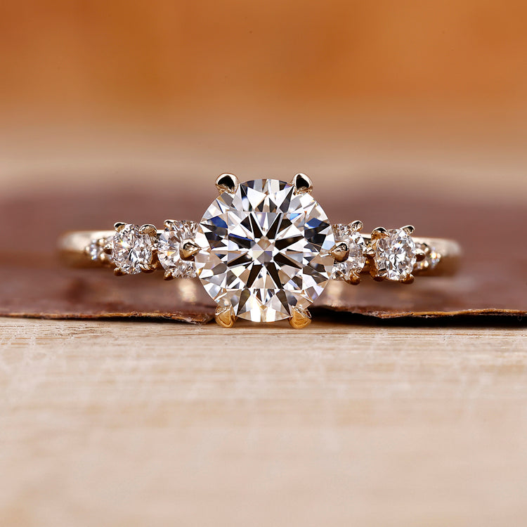 Yellow gold engagement ring with round diamond engagement ring.
