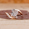 Three stone diamond ring in rose gold.
