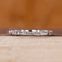 Full eternity diamond wedding band for her.
