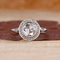 3 stone diamond ring with round rose cut ring.
