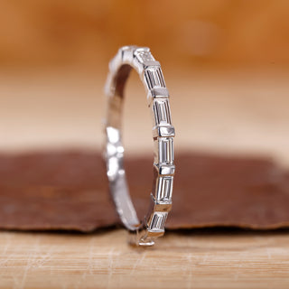 Baguette diamond wedding band in white gold.
