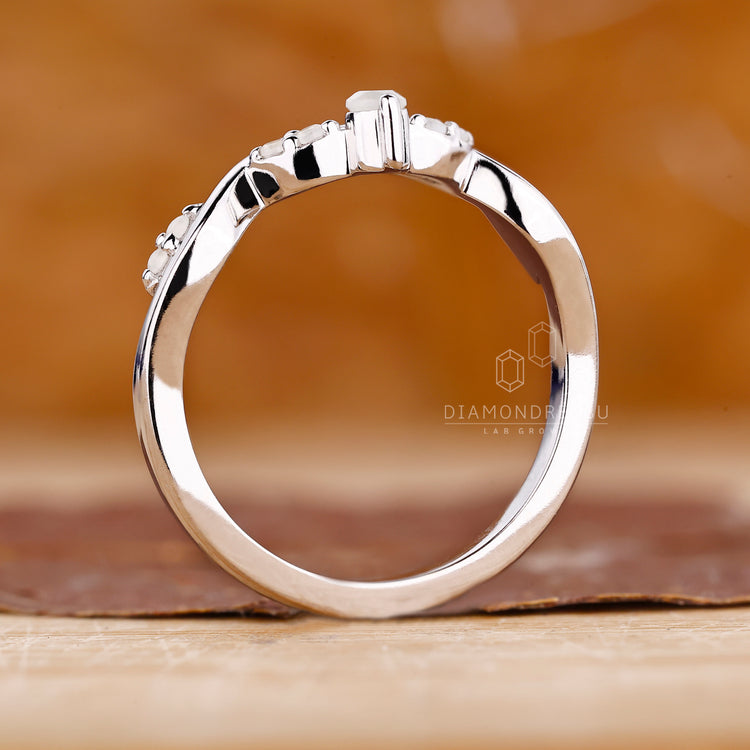 White Gold Band with round moonstones in a cluster style.
