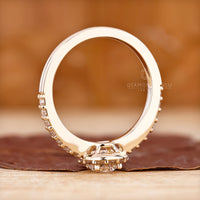 IGI certified round halo diamond ring in yellow gold.
