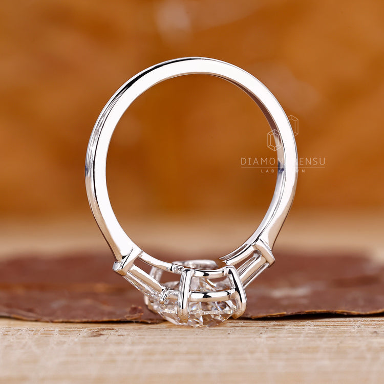 Lab Grown Diamond in 3 stone diamond engagement ring.
