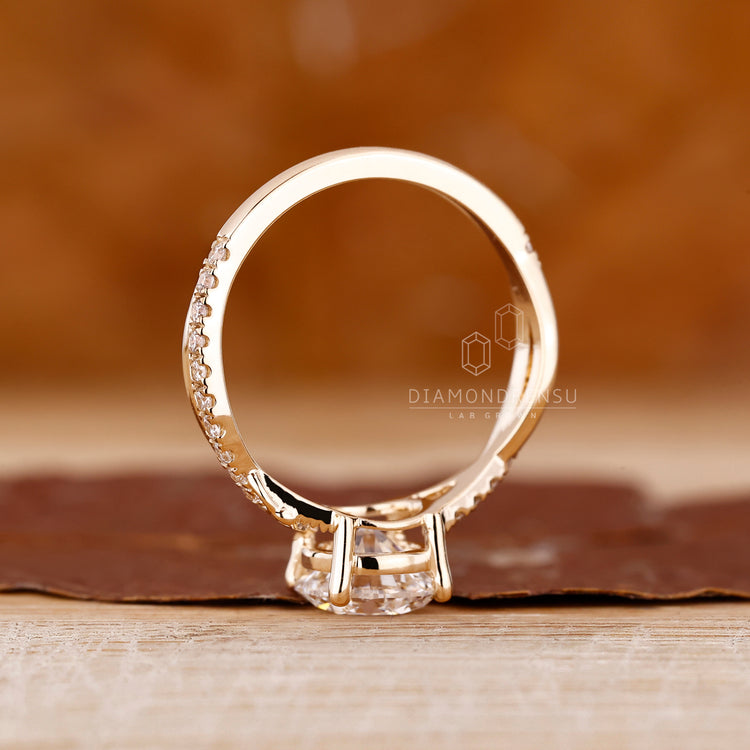 Custom Engagement Ring with round diamond and handmade finish.
