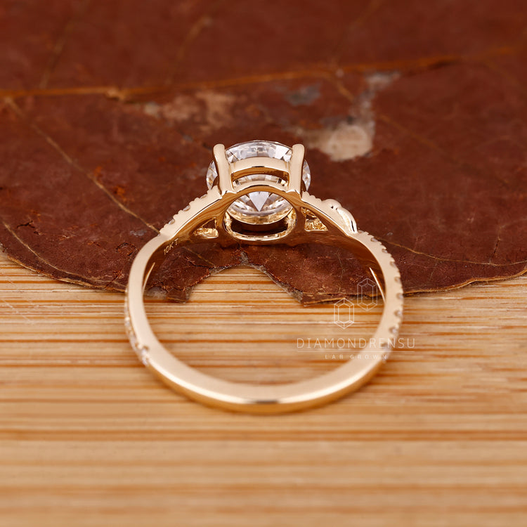 Lab Grown Diamond Ring with 4 prong setting and pave band.
