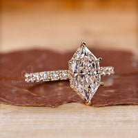 Dutch marquise engagement ring with pave setting ring.
