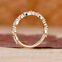 Half eternity wedding band with diamonds.
