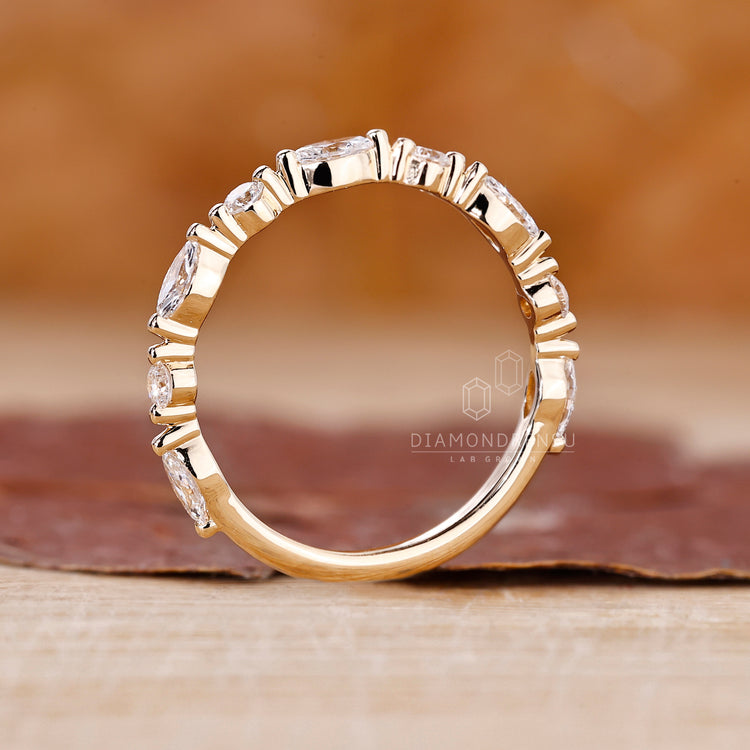Half eternity wedding band with diamonds.

