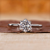 Solitaire engagement ring with round diamond engagement ring.
