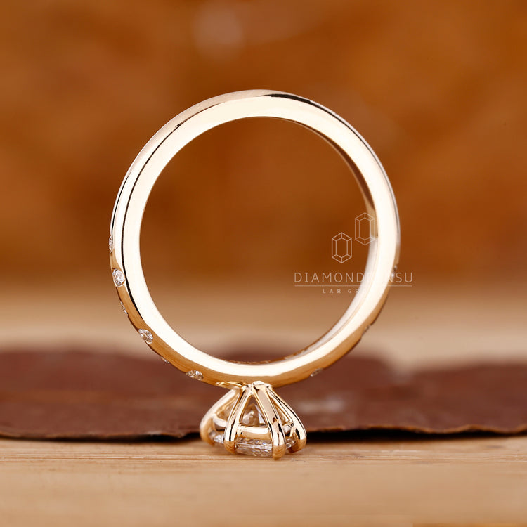 Yellow Gold Ring featuring flush pave and custom design.
