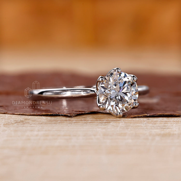 White gold engagement ring with solitaire engagement ring.
