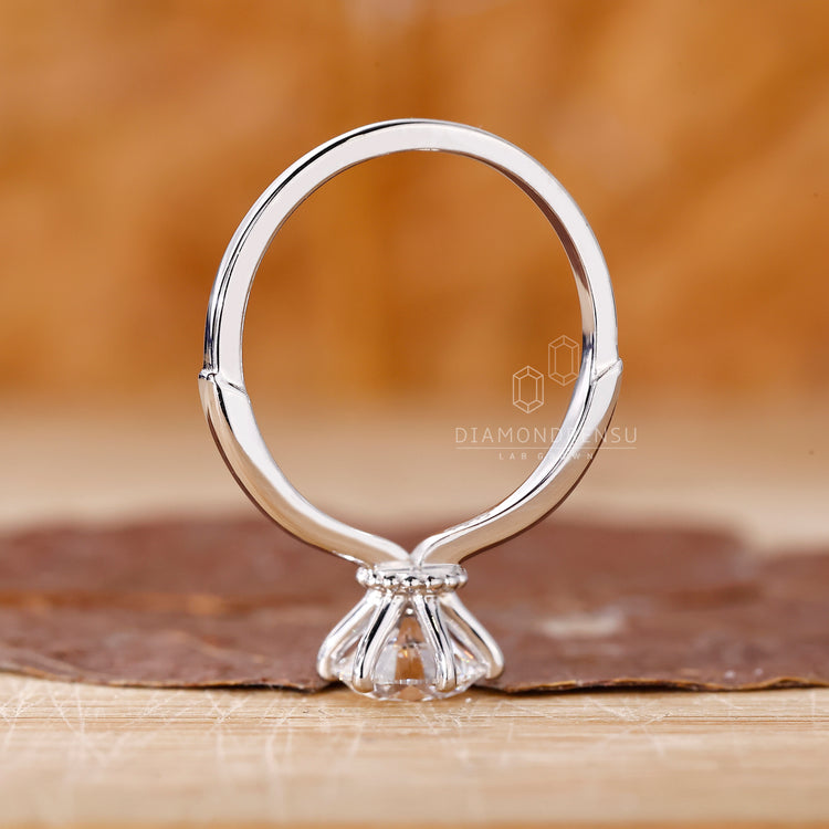 Lab Grown Diamond in solitaire engagement ring.
