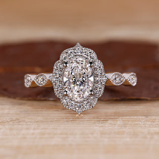 Halo Engagement Ring with oval shaped lab grown diamond.
