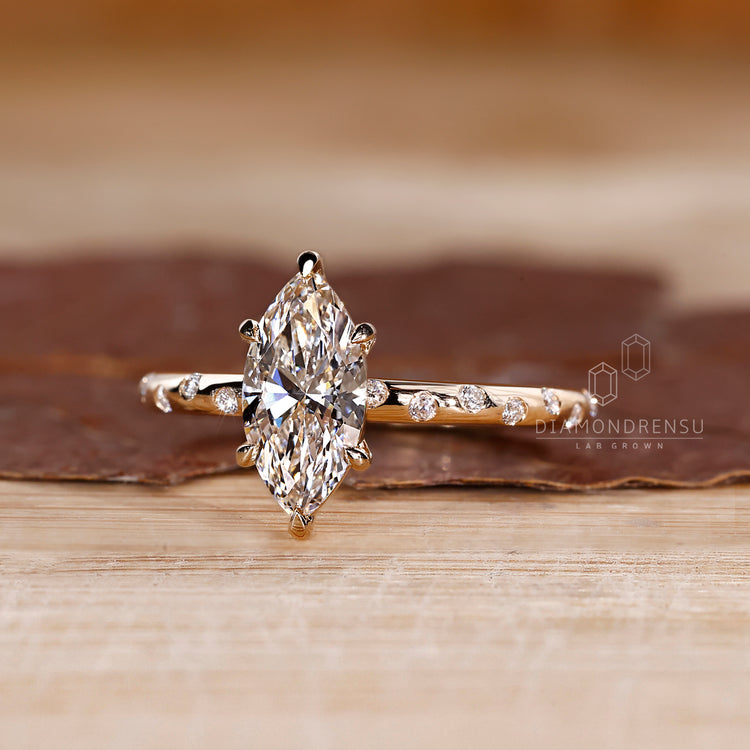 Round Cut Diamond Ring in handmade yellow gold band.
