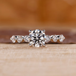 White gold engagement ring with 7 stone diamond engagement ring.
