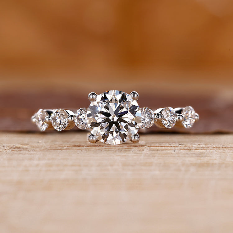 White gold engagement ring with 7 stone diamond engagement ring.

