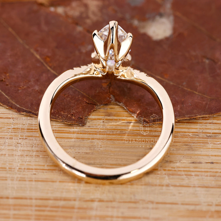 Lab Grown Diamond set in marquise engagement ring.
