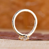 Buy Engagement ring with round side stone.
