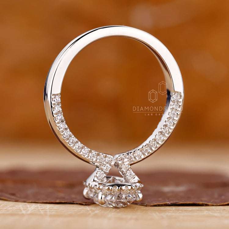 Buy Engagement ring with oval side stone.
