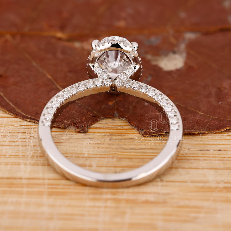 Lab Grown Diamond set in halo diamond engagement ring.
