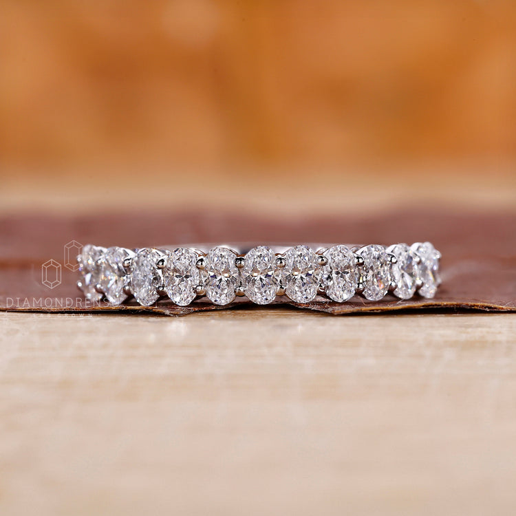 Half eternity diamond wedding band for her.