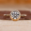 Round diamond engagement ring with vintage engagement ring.
