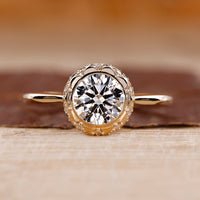 Round diamond engagement ring with vintage engagement ring.

