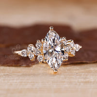 6 Prong Ring featuring a marquise center and custom design.
