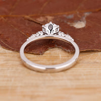 Custom diamond ring with unique tapered shank and 6 prong setting.

