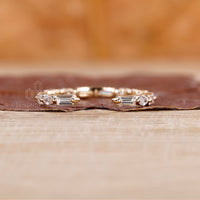Open gap wedding band with full eternity wedding band.