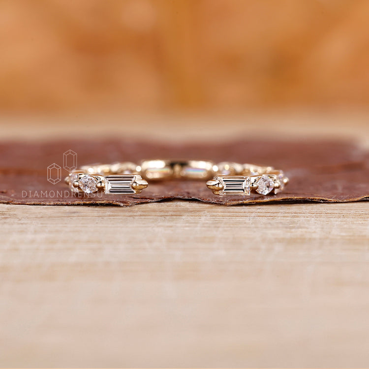 Open gap wedding band with full eternity wedding band.