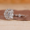 Half moon cut engagement ring with open gap ring.
