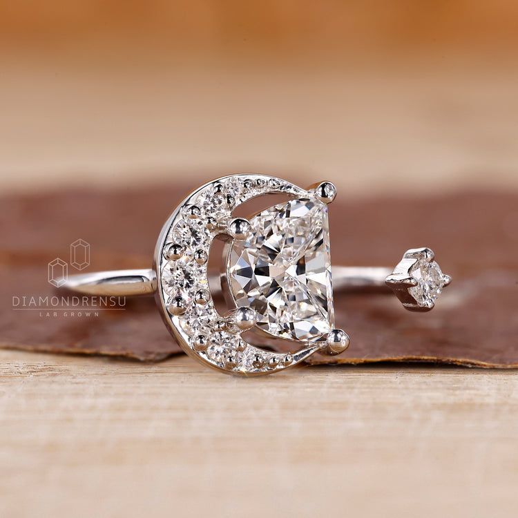 Unique engagement ring made in half moon cut style.
